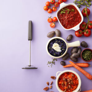Food mashing product featured with three different recipes in a lifestyle image.