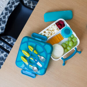 Children's lunchbox product photography in kitchen setting.