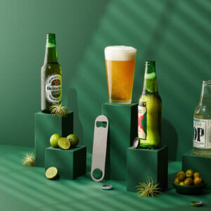 Green theme still life of beer bottle opener for Houdini Barware.