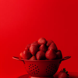 Red strawberries monochromatic still life