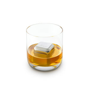 Whiskey glass ecomm photography displaying a metal whiskey stone product.